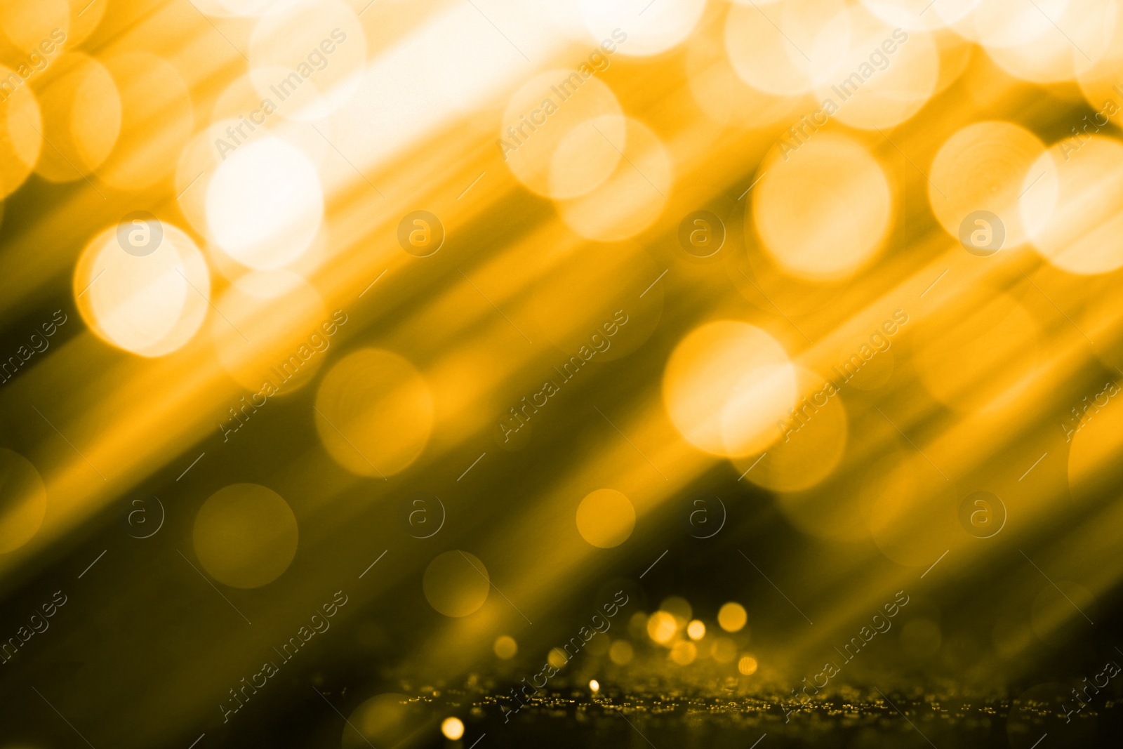 Image of Beautiful abstract background with defocused golden lights