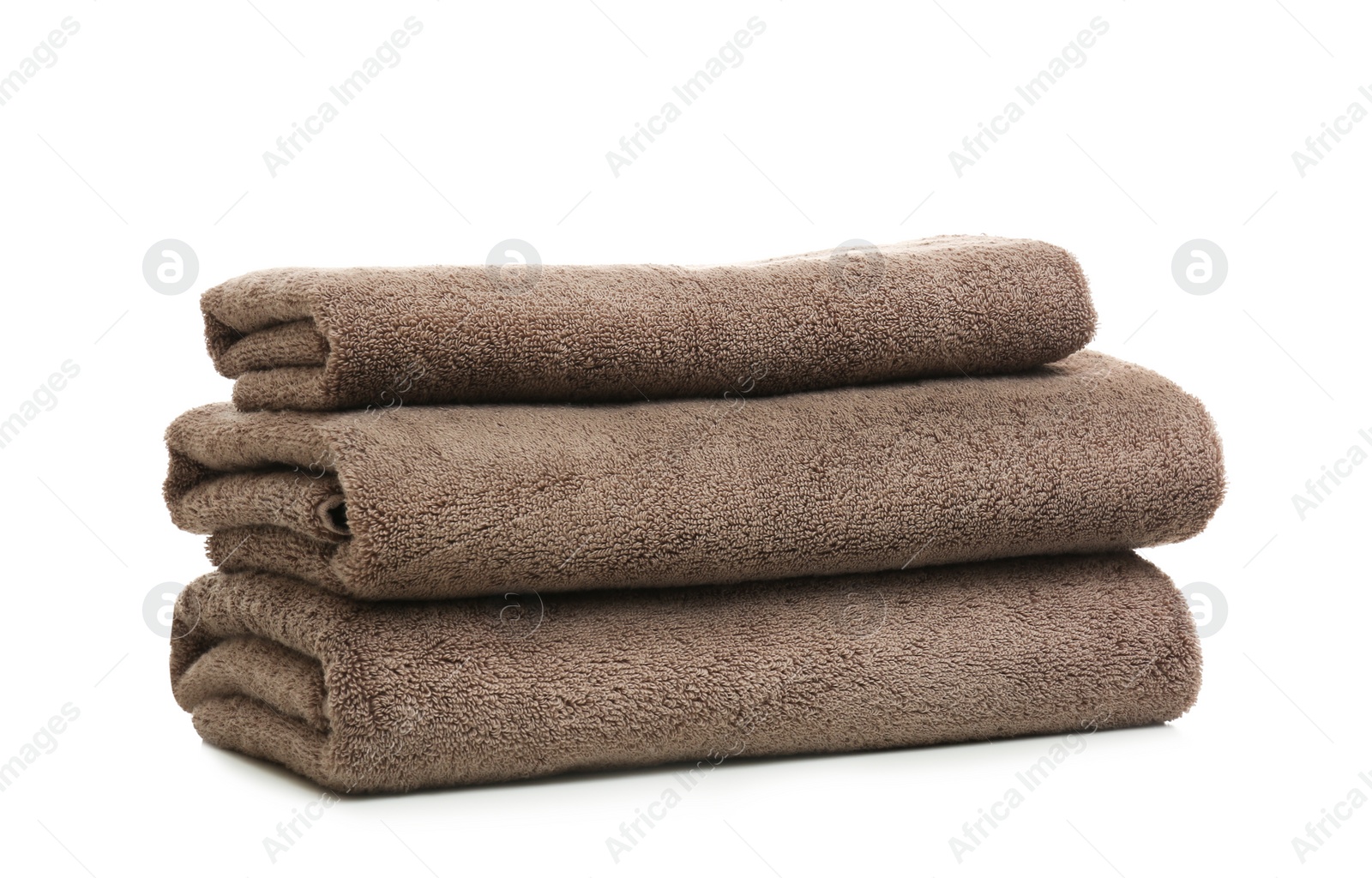 Photo of Stack of clean folded towels on white background