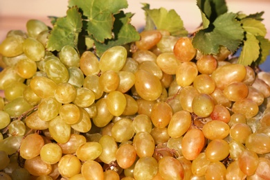 Photo of Fresh ripe juicy grapes as background, closeup