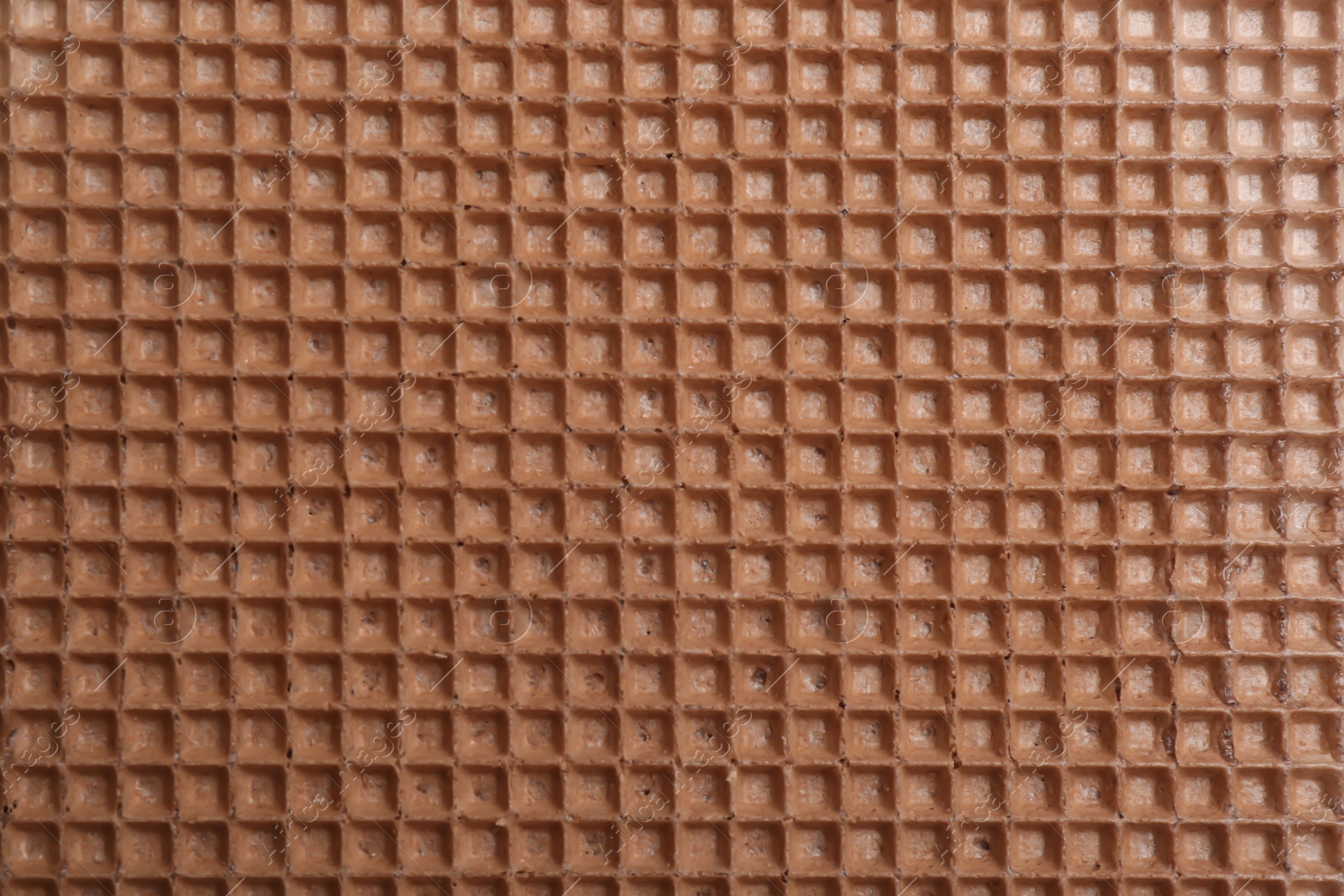 Photo of Tasty wafer as background, closeup. Crispy food