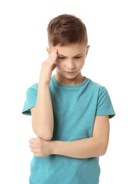 Photo of Little boy suffering from headache on white background