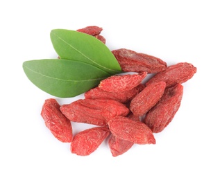 Pile of dried goji berries and leaves on white background