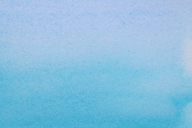 Photo of Abstract light blue watercolor painting as background, top view