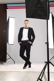 Handsome model posing in studio. Professional photo session