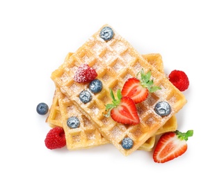 Photo of Delicious waffles with berries on white background, top view