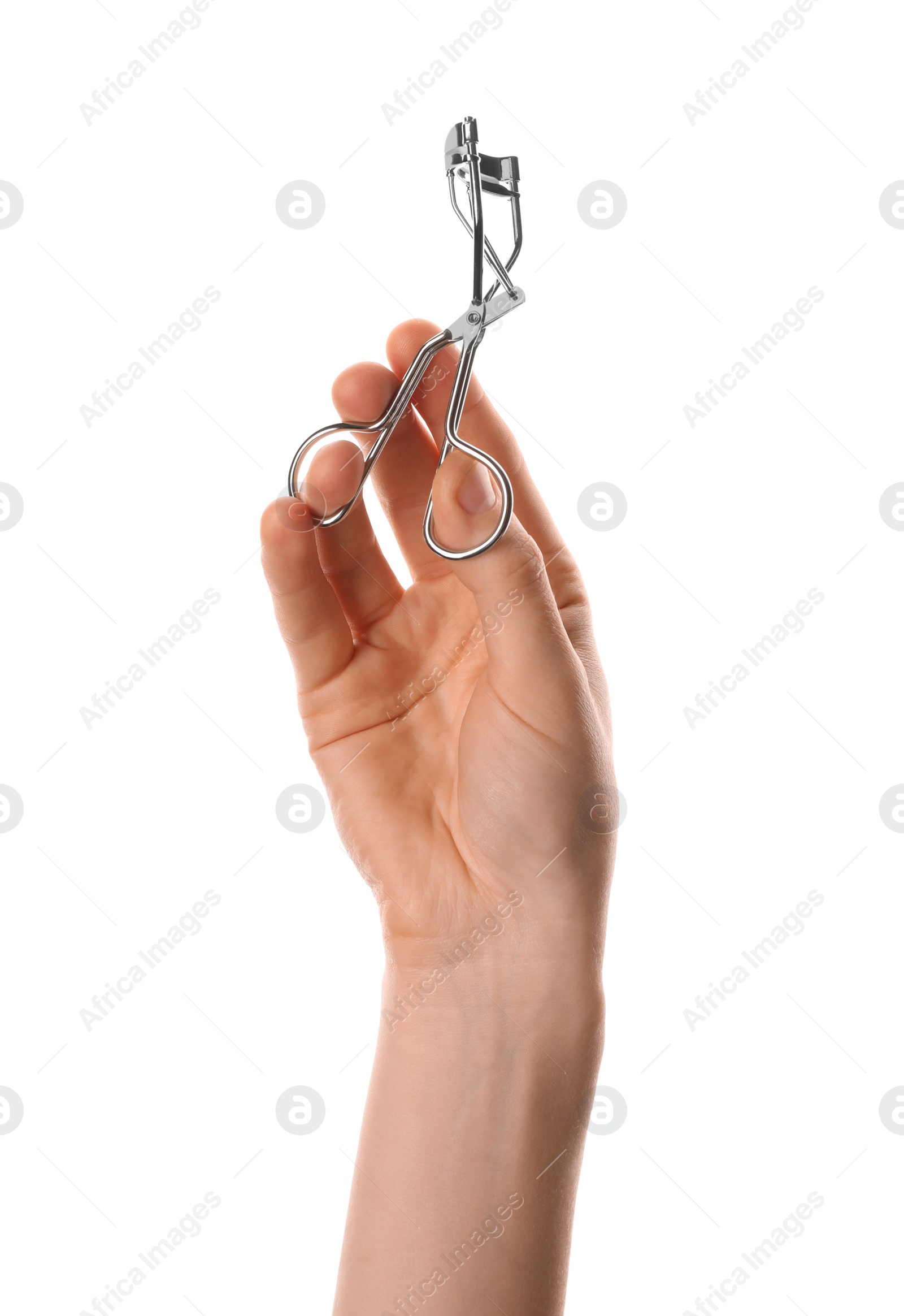 Photo of Woman holding eyelash curler on white background, closeup. Makeup tool