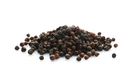 Photo of Black pepper grains on white background. Natural spice