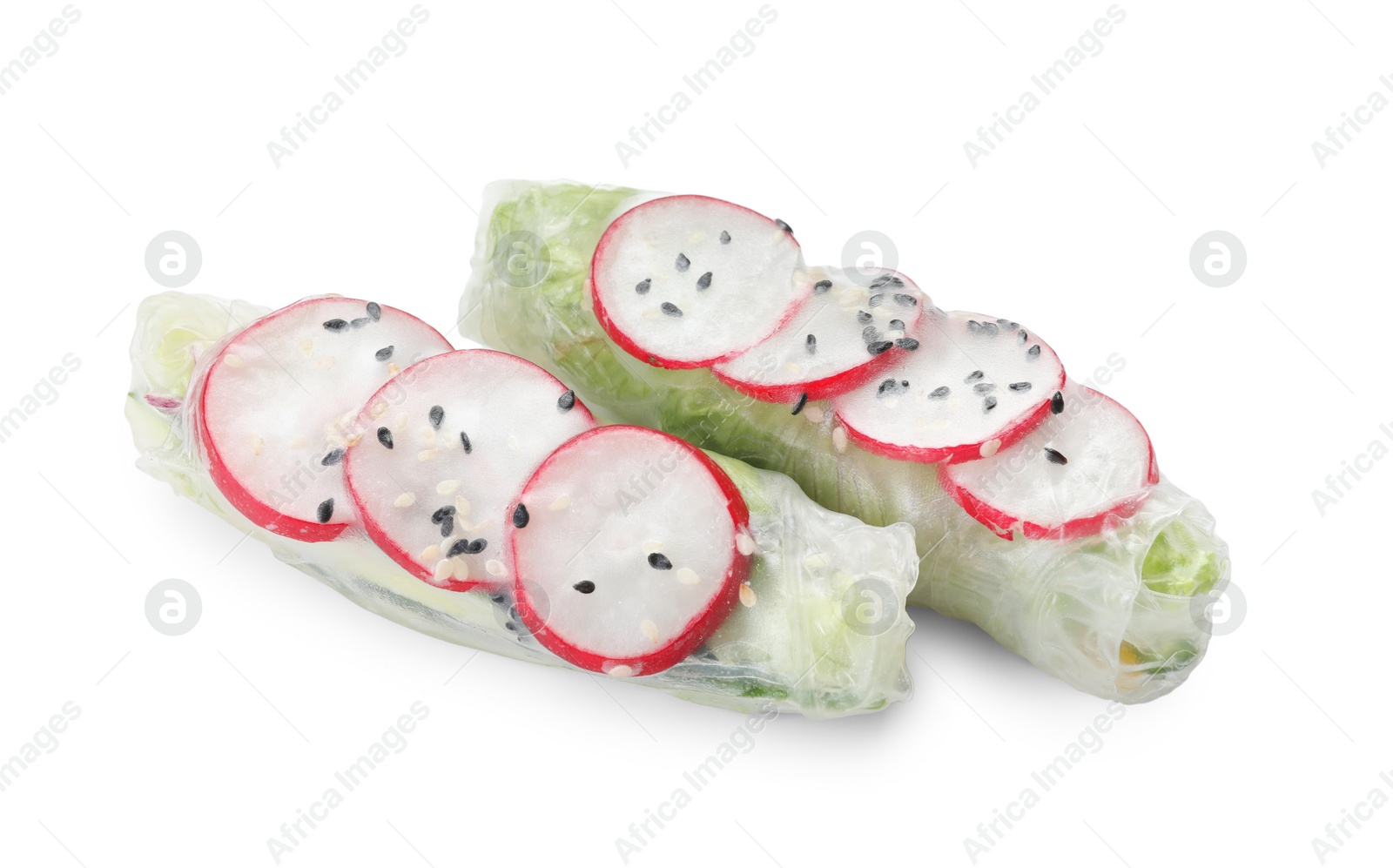 Photo of Delicious spring rolls wrapped in rice paper isolated on white