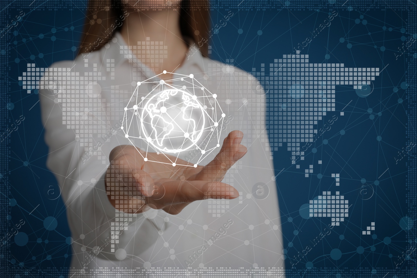 Image of Young woman demonstrating world globe with network connection lines on blue background, closeup. Modern technology