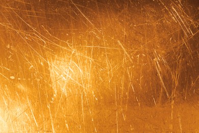 Image of Golden textured surface as background, closeup view