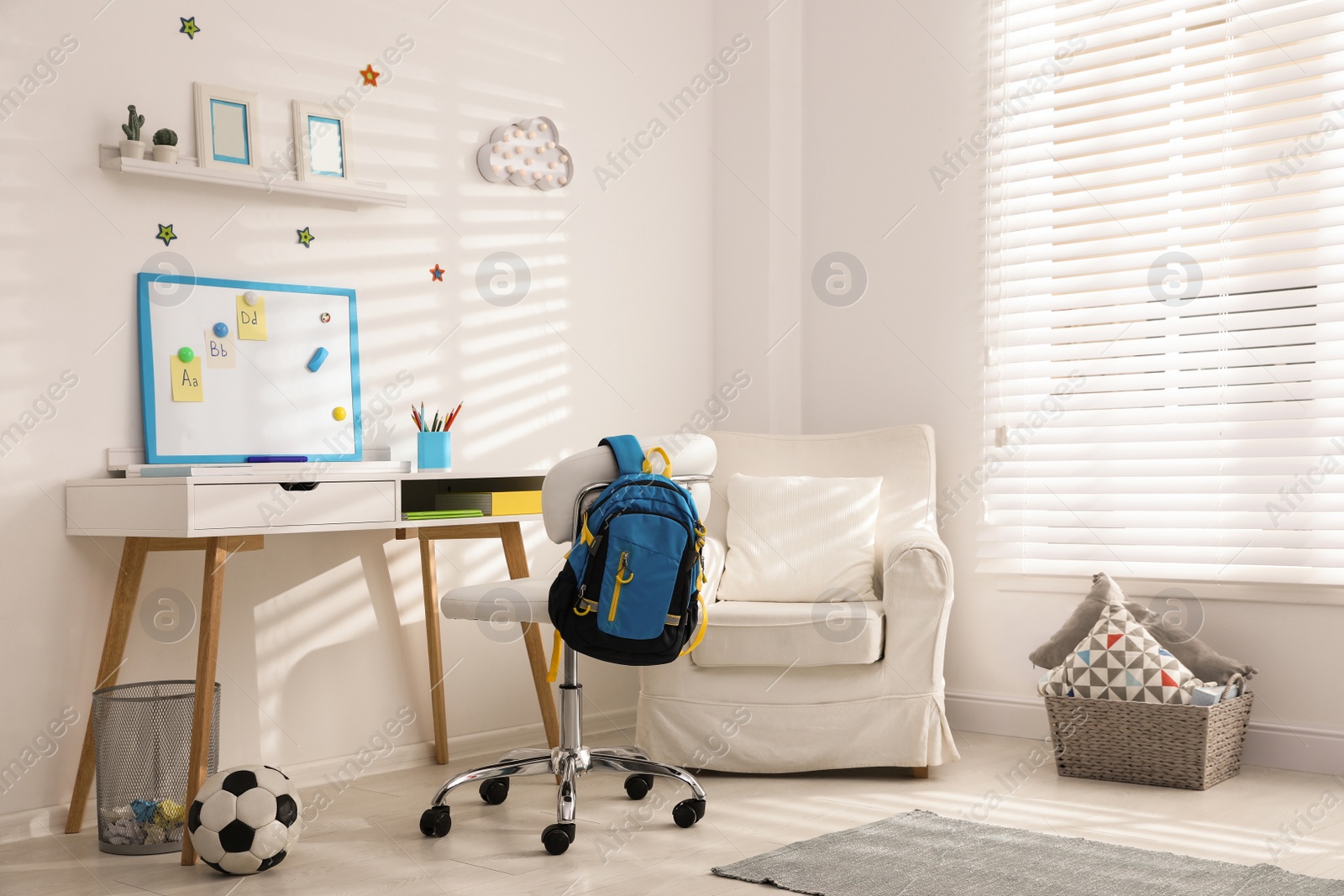 Photo of Modern child room interior with stylish furniture