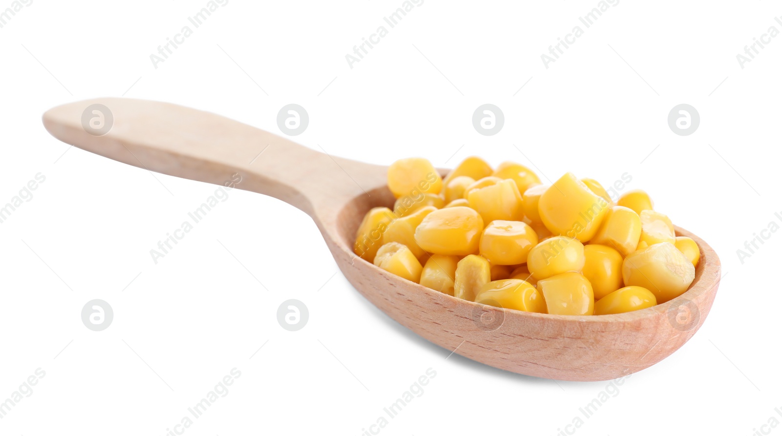 Photo of Delicious canned corn in spoon isolated on white