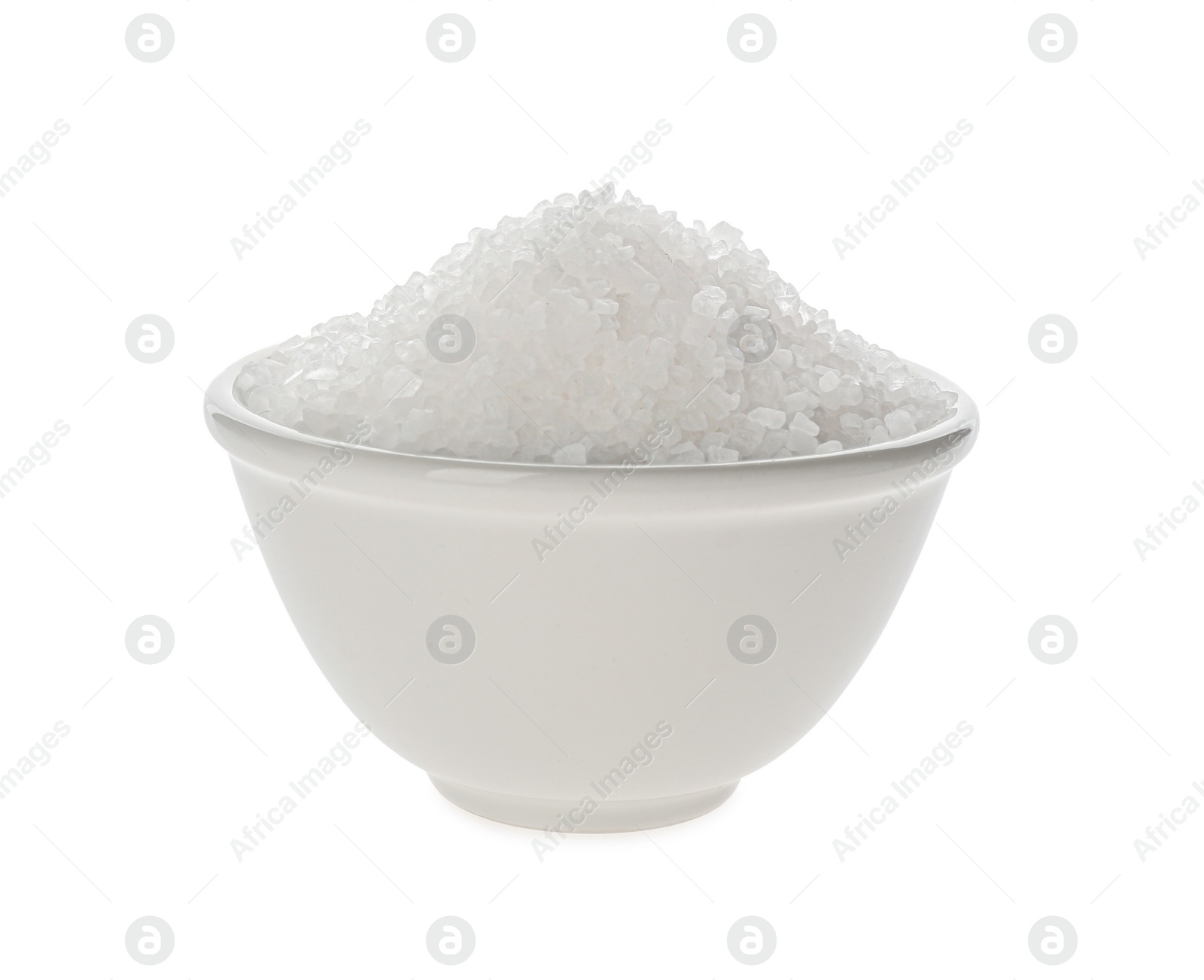 Photo of Bowl with natural salt isolated on white