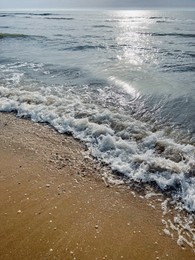 Beautiful view of sandy beach and sea