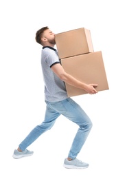 Full length portrait of young man carrying carton boxes on white background. Posture concept