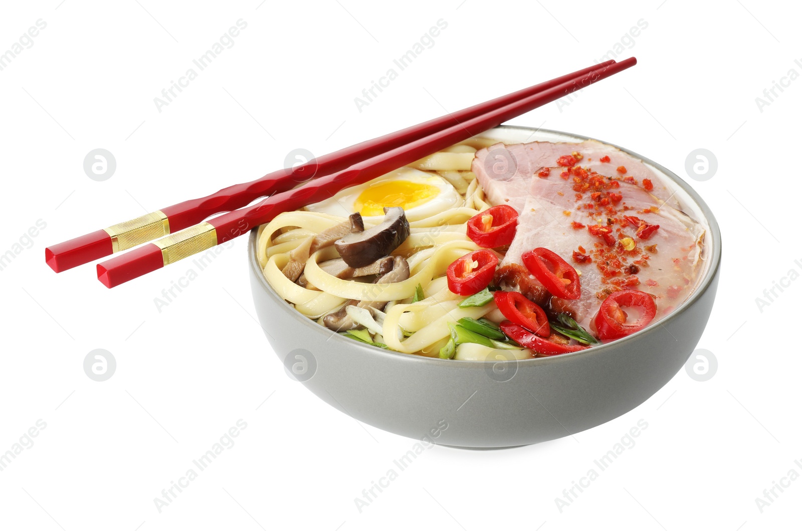 Photo of Delicious ramen in bowl and chopsticks isolated on white. Noodle soup