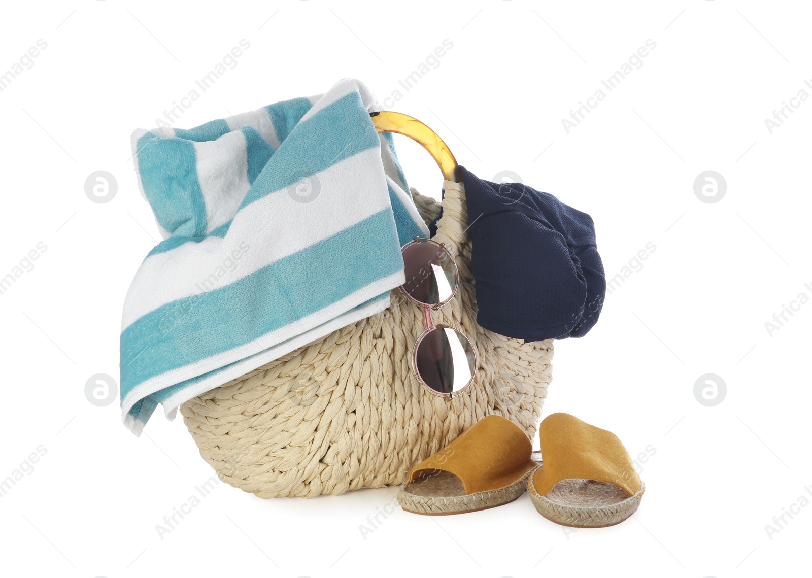 Photo of Bag with beach accessories on white background