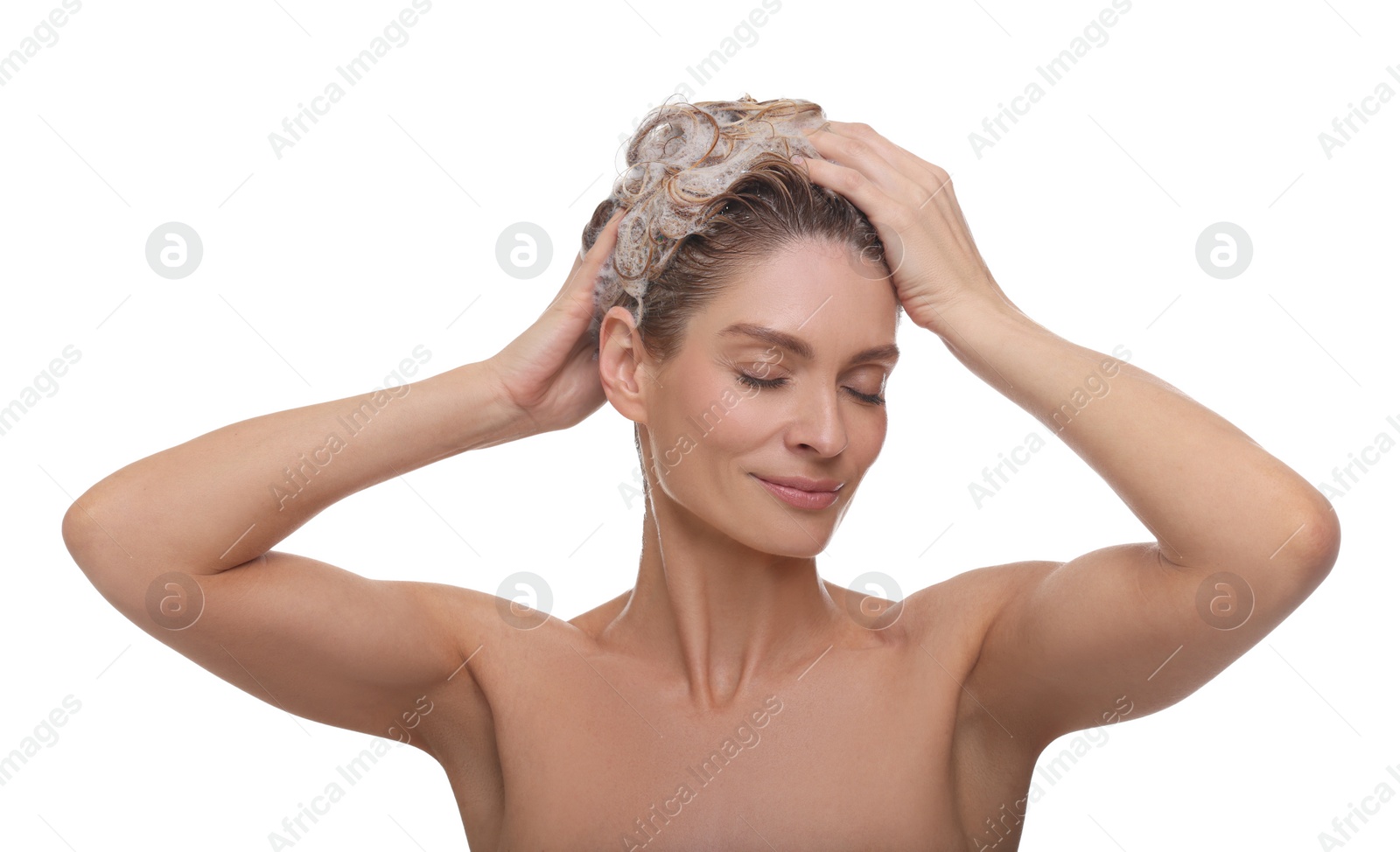 Photo of Beautiful woman washing hair on white background