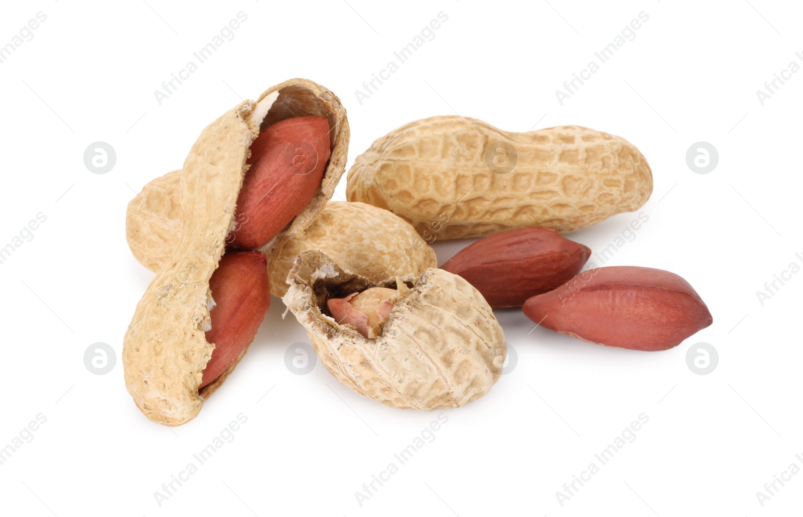 Photo of Fresh unpeeled peanuts isolated on white. Healthy snack