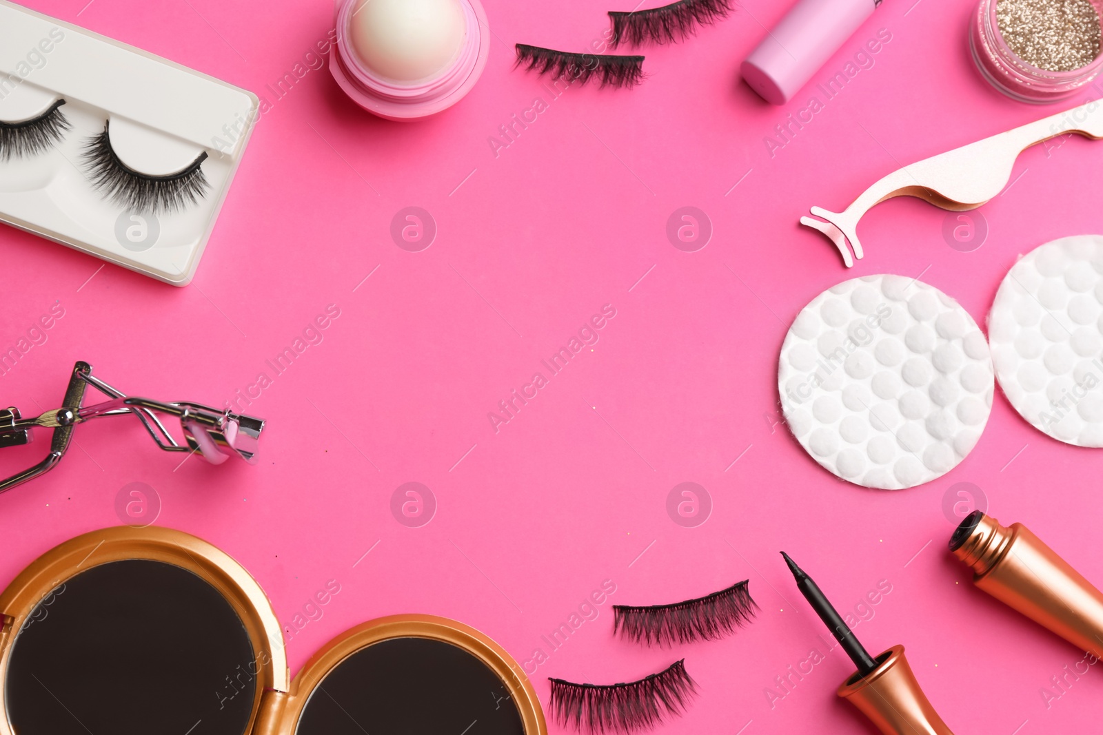 Photo of Flat lay composition with magnetic eyelashes and accessories on crimson background. Space for text