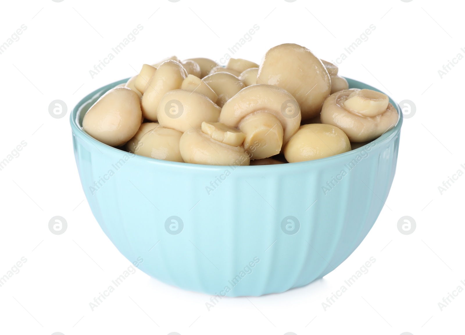 Photo of Tasty marinated mushrooms in bowl isolated on white