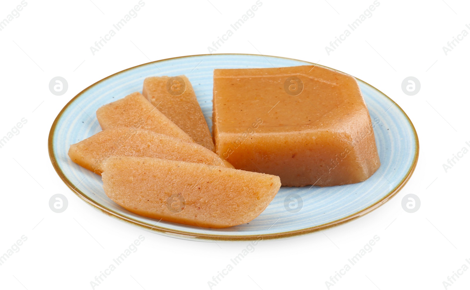 Photo of Delicious sweet quince paste and isolated on white