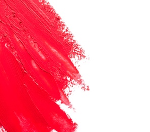 Photo of Red lipstick smears on white background, top view. Space for text