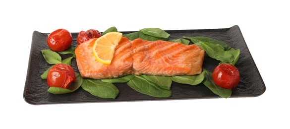 Tasty grilled salmon with tomatoes, spinach and lemon on white background