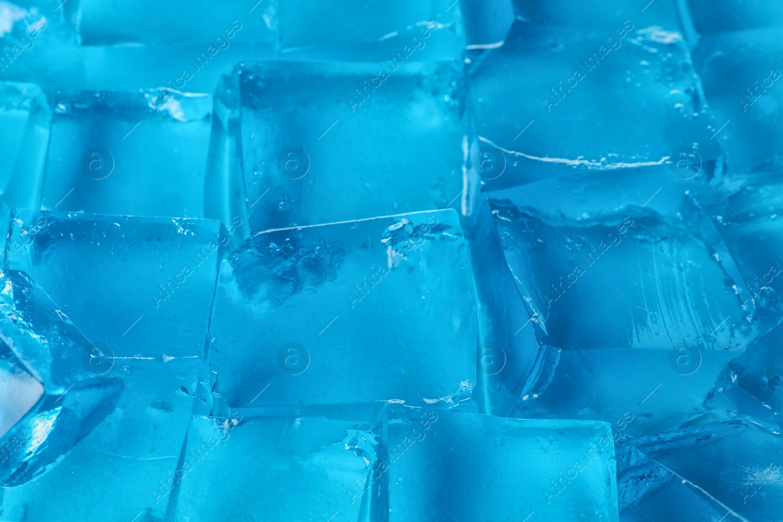 Photo of Blue jelly cubes as background, closeup view