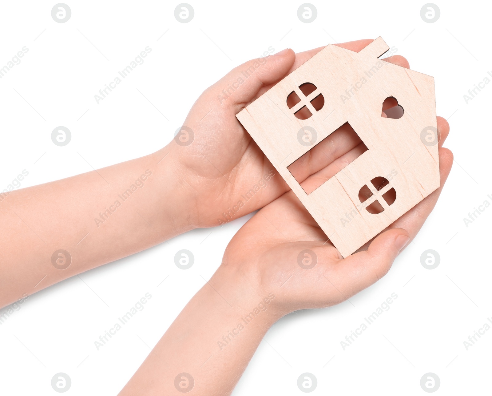 Photo of Home security concept. Little child holding house model on white background, top view