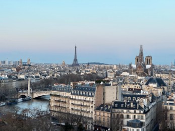 Photo of Beautiful buildings, Eiffel tower and river in Paris, view from hotel window