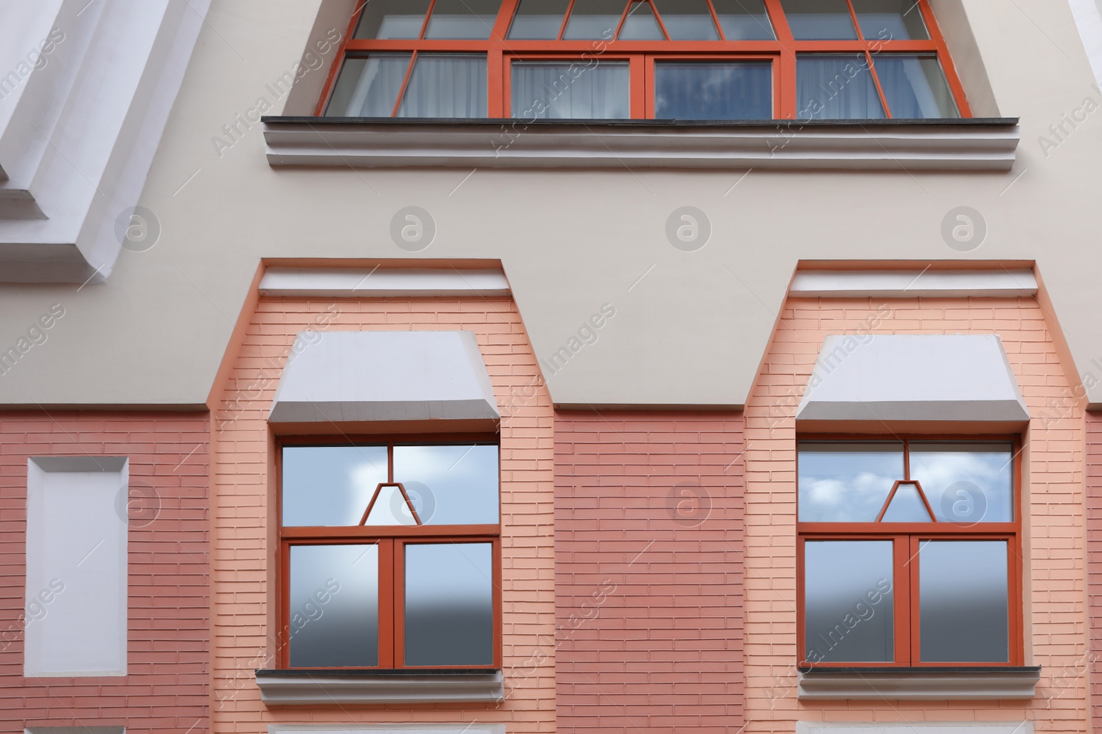 Photo of Wall of vintage building with beautiful windows