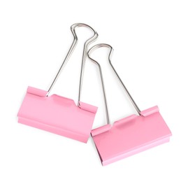 Photo of Pink binder clips on white background, above view. Stationery item