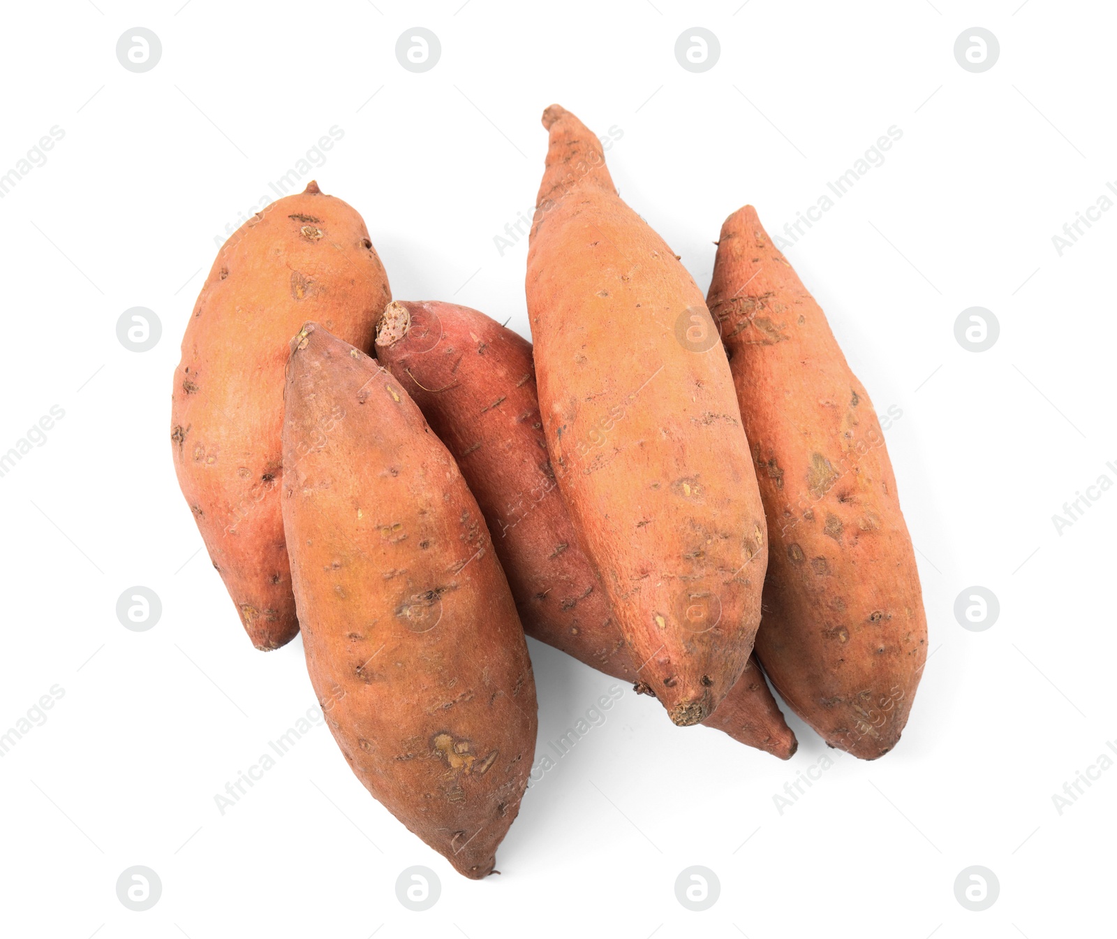 Photo of Heap of whole ripe sweet potatoes on white background, top view