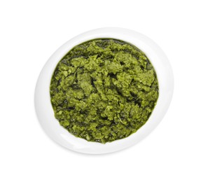 Delicious pesto sauce in bowl isolated on white, top view