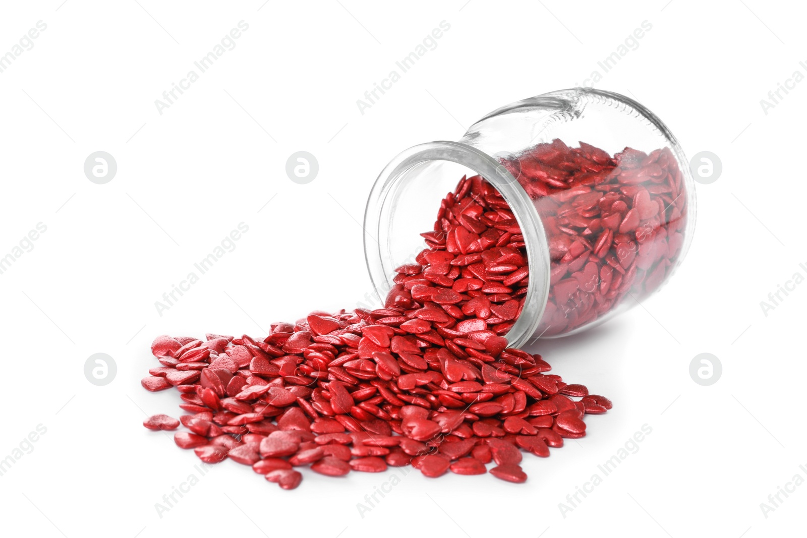 Photo of Jar and scattered candy hearts on white background