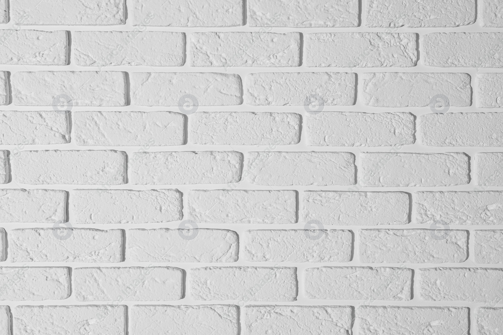 Photo of Texture of white brick wall as background