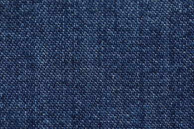 Photo of Texture of soft blue fabric as background, top view