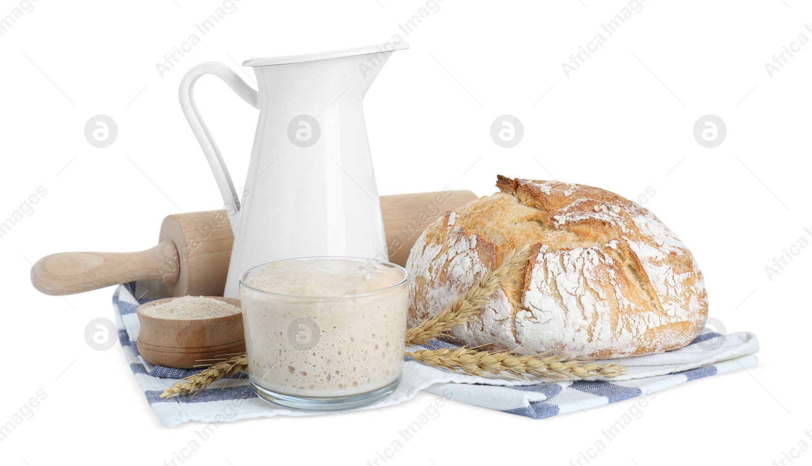 Photo of Freshly baked bread, sourdough and other ingredients on white background