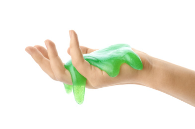 Photo of Woman playing with green slime isolated on white, closeup. Antistress toy