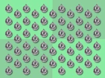 Image of Many shiny disco balls on green background, flat lay