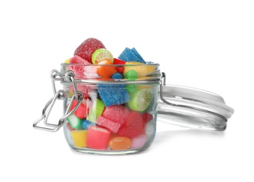 Photo of Jar with delicious colorful candies on white background