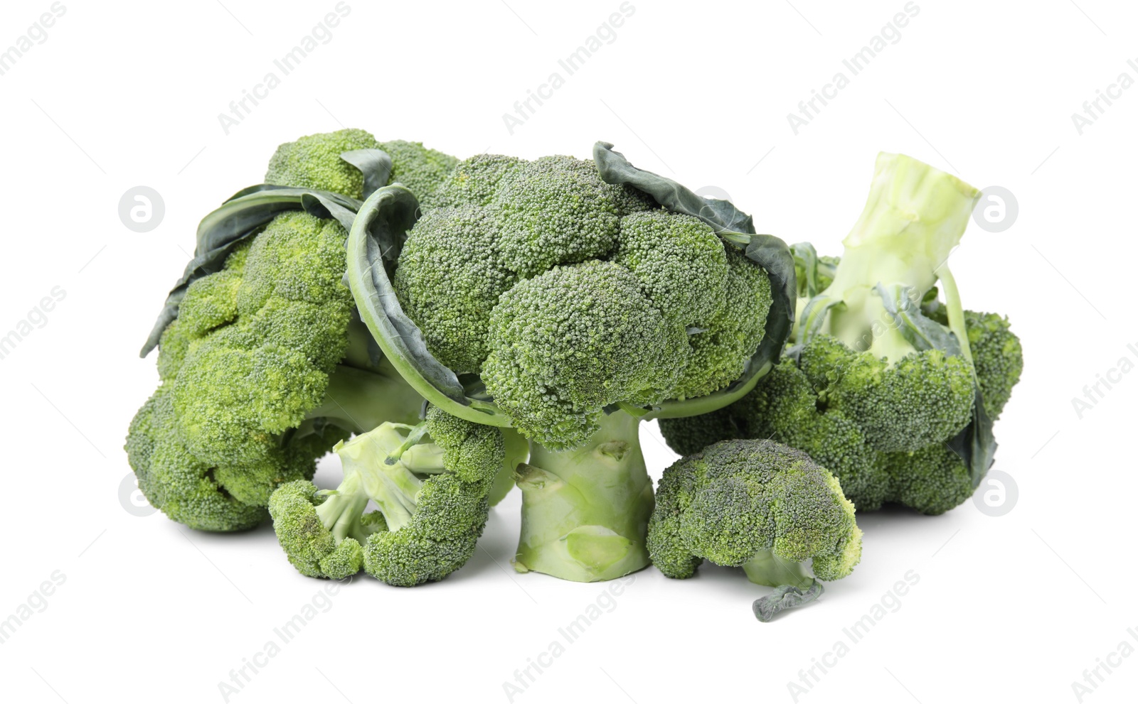 Photo of Pile of fresh raw green broccoli isolated on white