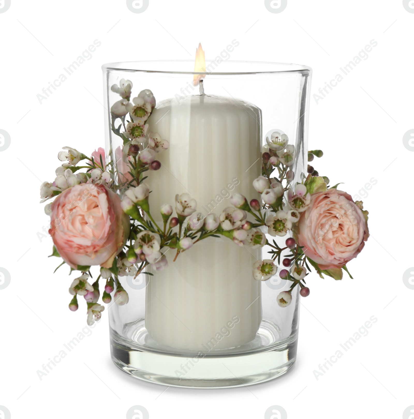 Photo of Glass holder with burning candle and floral decor isolated on white