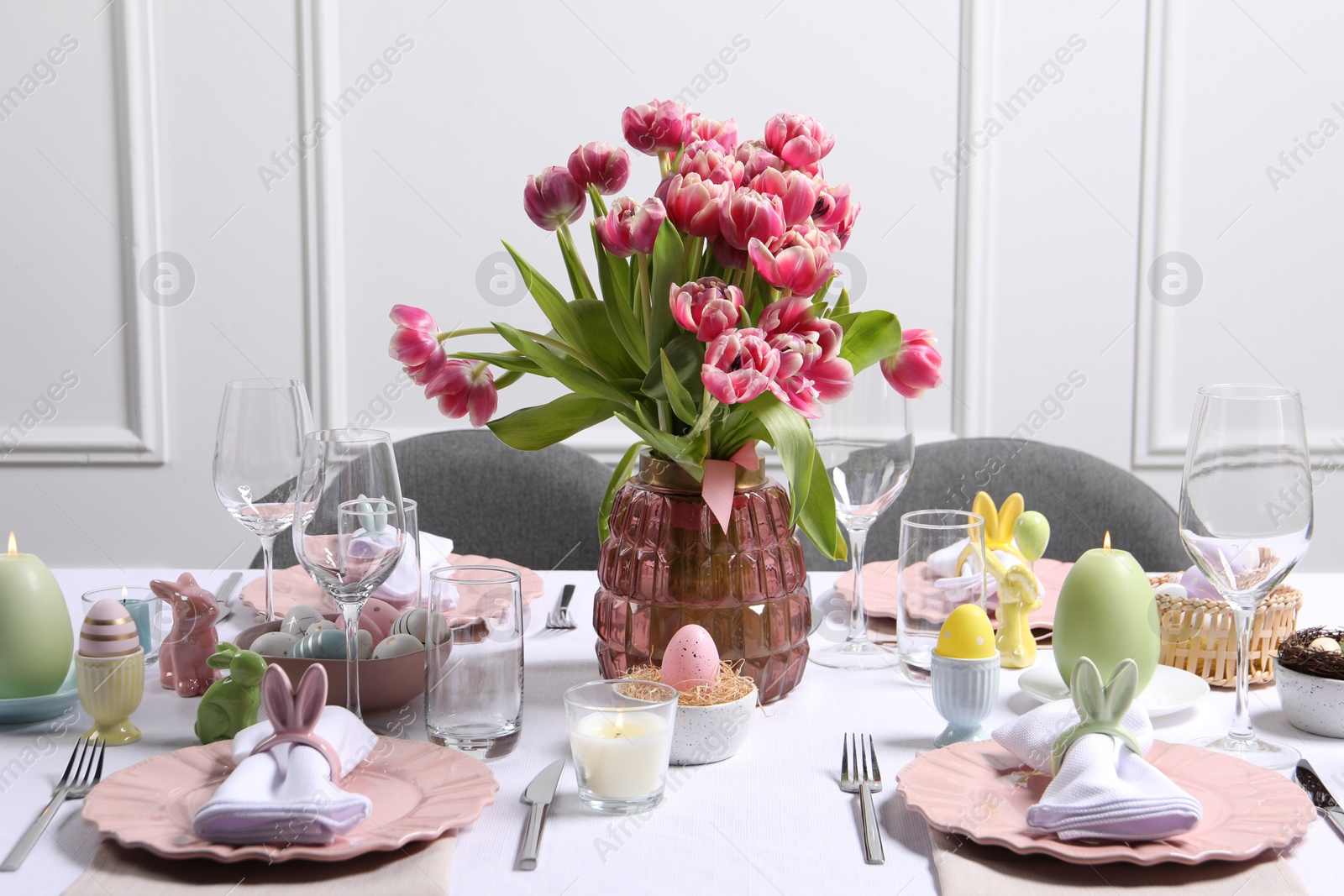 Photo of Festive table setting with beautiful flowers. Easter celebration