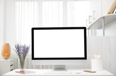 Photo of Comfortable workplace with modern computer on table