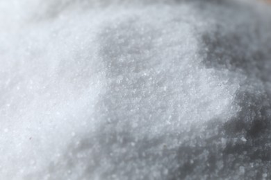 Photo of Organic white sea salt as background, closeup