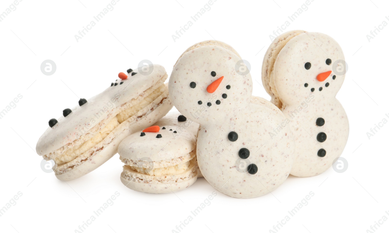 Photo of Beautifully decorated Christmas macarons on white background