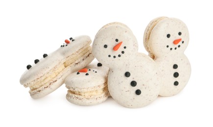 Photo of Beautifully decorated Christmas macarons on white background