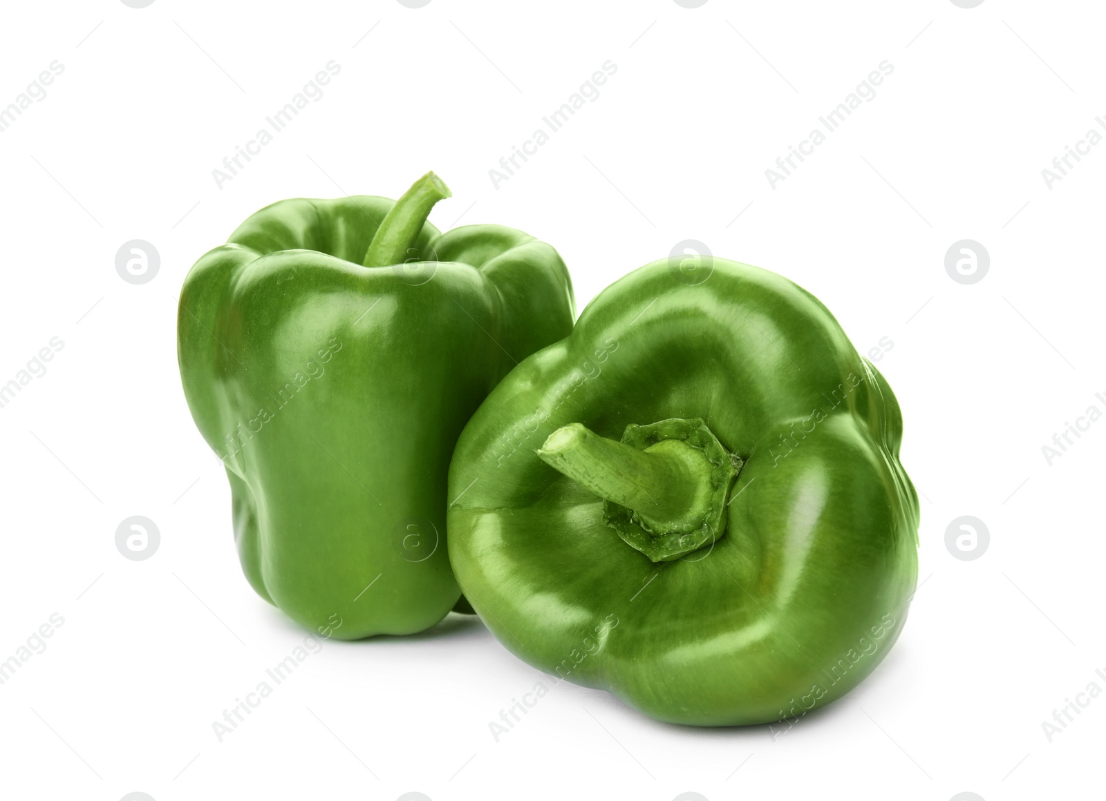 Photo of Raw ripe paprika peppers on white background